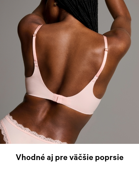 Back side of a woman posing in a baby pink a Victoria's Secret Lightly lined bra.