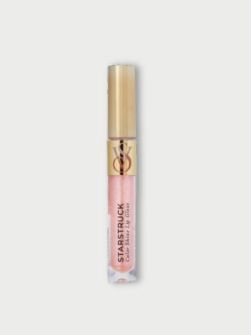 Victoria's Secret pink Flavored lip gloss tube on a light grey background