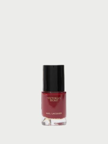 Victoria's Secret White Peach Mango Coconut Milk bottle on a light grey background 