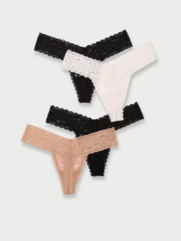 Back view of a woman wearing Victoria's Secret brown Brazilian lace panties